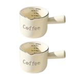 To keramiske målebægre med håndtag, hældetud og indvendig skala til espresso, mælk, honning og sauce