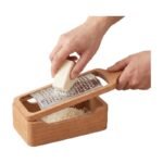 Cheese Slicer with Storage Box for Practical Grating and Tidy Collection in the Kitchen