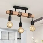 Wooden beam ceiling light with three pendants in a kitchen