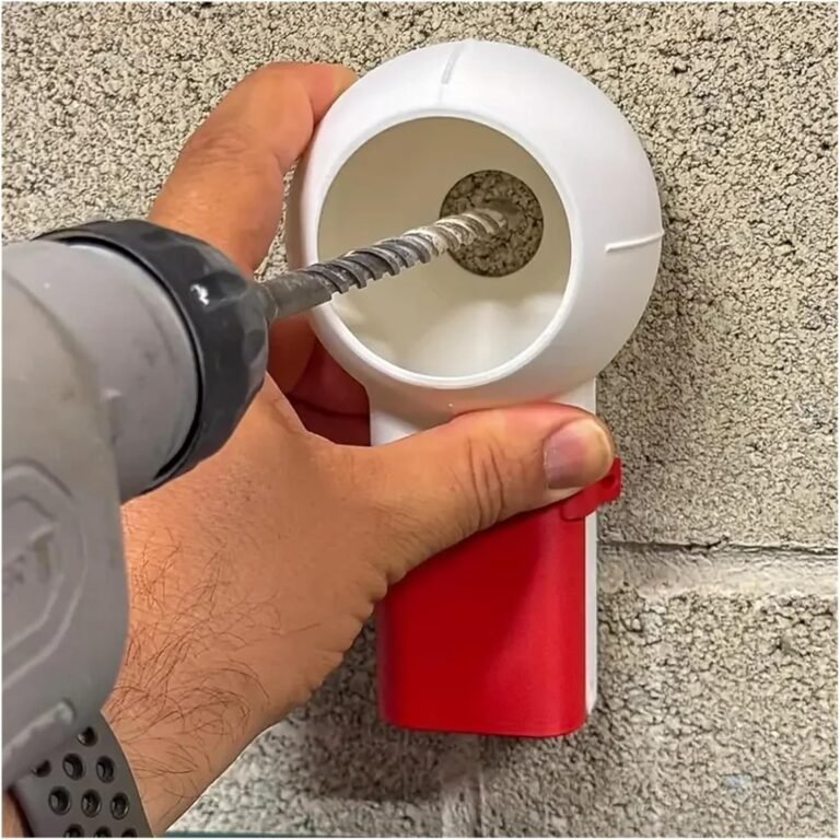 Drill dust collector held against a brick wall while drilling
