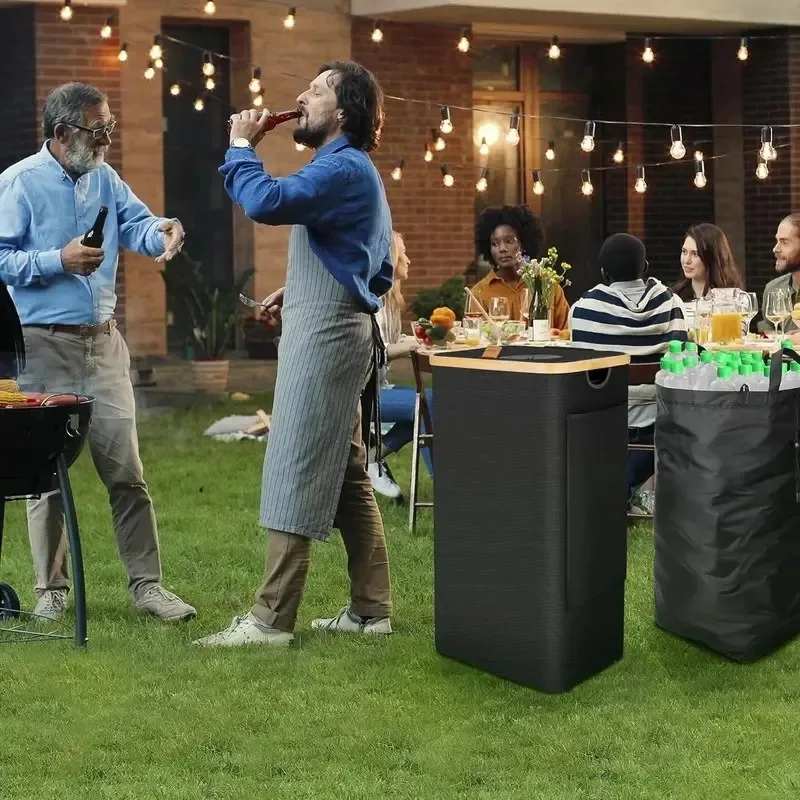 Collapsible deposit container with lid and inner bag at a garden party