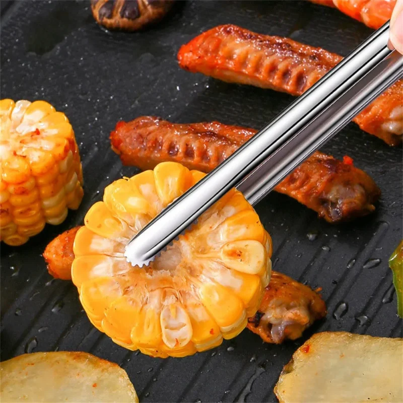 Serving Tongs in Stainless Steel in use at home