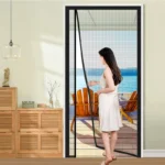Magnetic mesh door screen fitted in a patio doorway