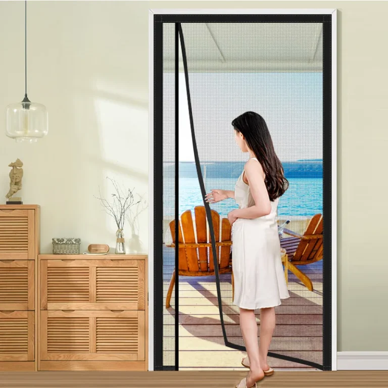 Magnetic mesh door screen fitted in a patio doorway