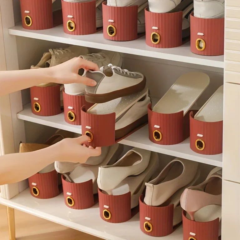 Brown-red shoe stackers holding shoes on cabinet shelves