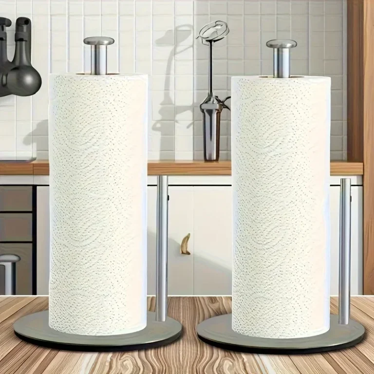 Stainless steel paper towel holders on a kitchen worktop