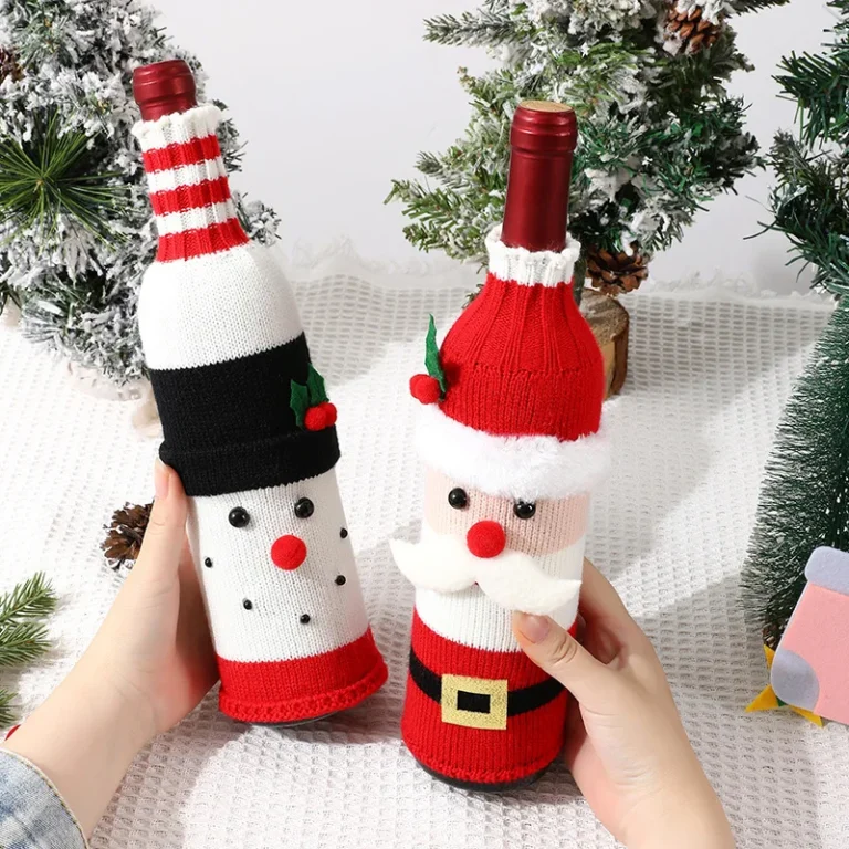 Knitted snowman and Santa wine bottle covers in a festive Christmas setting