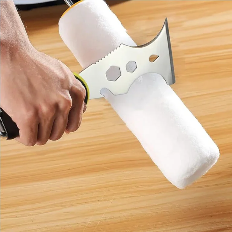 15-in-1 paint scraper multi-tool being used to clean a paint roller