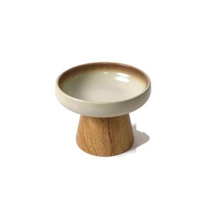 Ceramic cat bowl on wooden stand