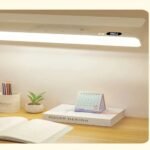 Magnetic LED lamp above a desk