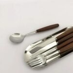 Oval steel tray with cutlery
