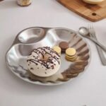 Shell plate with doughnut and biscuits