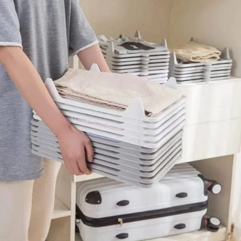 Stackable clothes organisers with folded clothes in a wardrobe